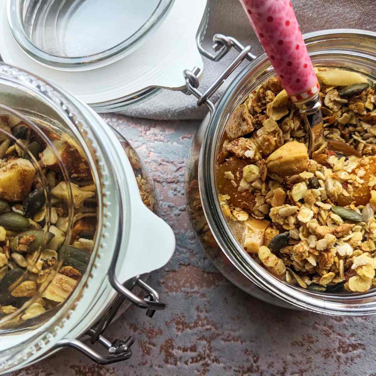 Homemade granola in glass mason jars.