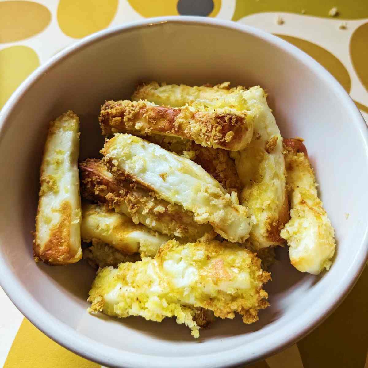 Halloumi fries in a white bowl