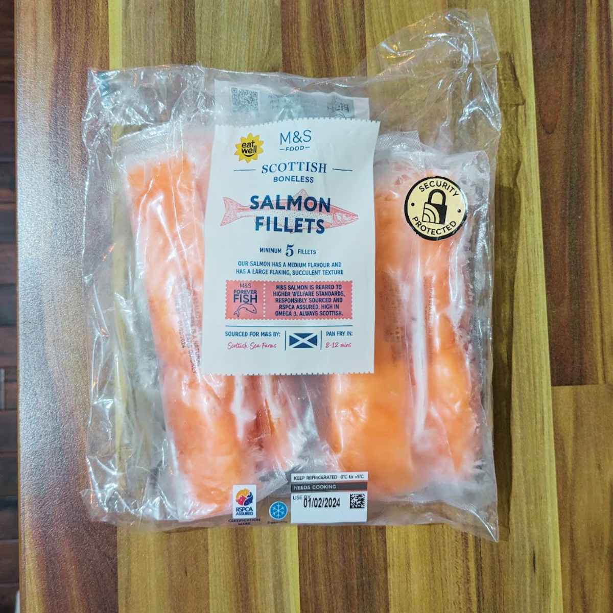A pack of frozen salmon fillets.
