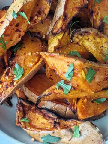Sweet potato wedges in a white bowl