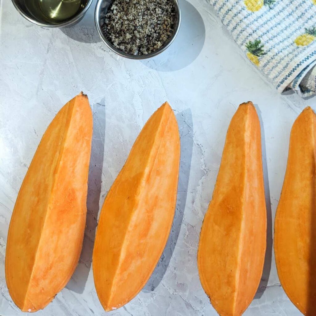 A sweet potato cut into quarters.